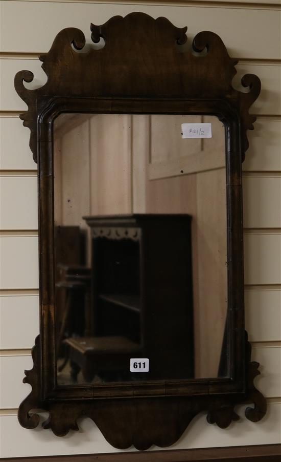 A fret frame wall mirror